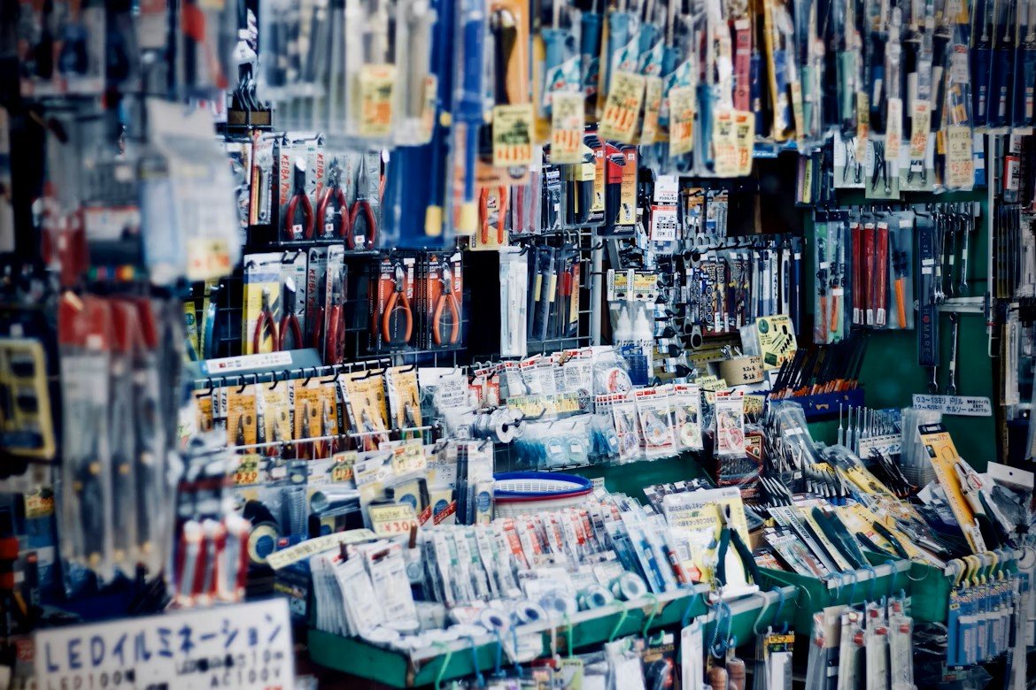 Chinese construction materials including tiles, panels, and industrial building profiles
